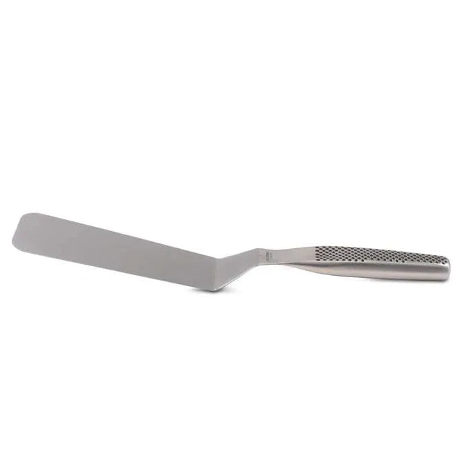 A stainless steel spatula with an offset handle featuring a dimpled grip on white background.