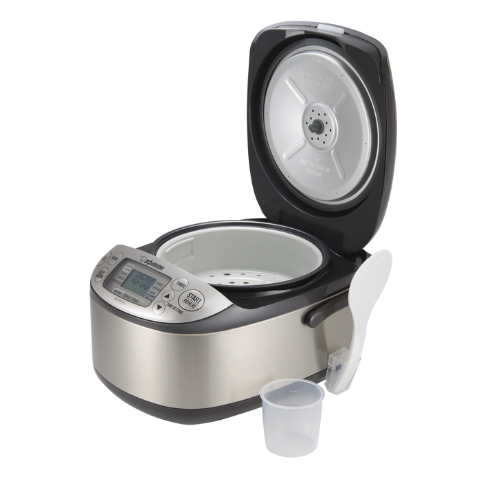 Accessories include steaming basket, rice measuring cup, nonstick rice spatula and spatula holder