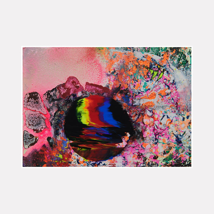 The artwork 'Slippery Planet' features a vibrant abstract composition with a dark cosmic void centered amidst explosive pink and coral tones. Rainbow-like streaks of yellow, red, and blue burst through the center, surrounded by textured splatter effects in turquoise and green. Created using mixed media on wood by Millie Benson.